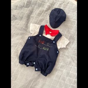 Baby clothes size 00. Never used. Colors red, white, navy blue and green.